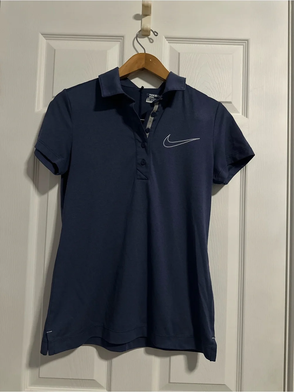Nike Women's Navy Polo Top with Rhinestone Swoosh